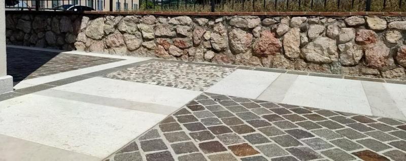 Pavimento esterno in porfido con decori Vicenza