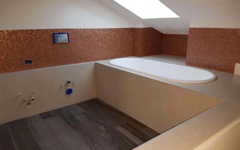 Attic bathroom with bathtub Vicenza