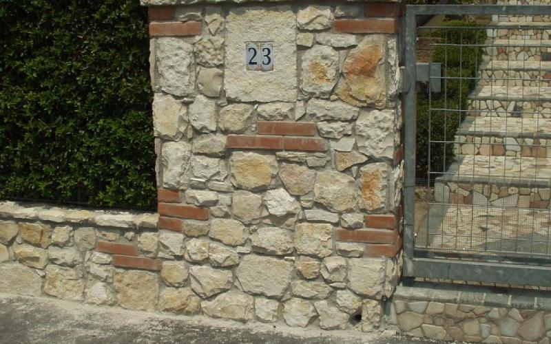rivestimento esterno pietra sasso negozio Vicenza