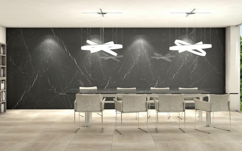 Progetto per una sala riunioni con grandi lastre in gres effetto marmo