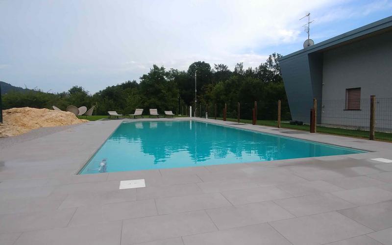 Modern outdoor in-ground swimming pool in Valdagno Vicenza